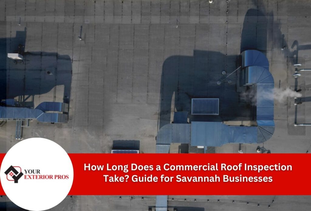 Aerial view of commercial building rooftop with HVAC units and ventilation systems